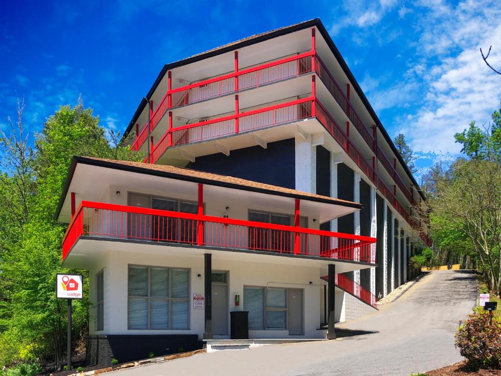 a building with red balconies on the side of it at Gatlinburg View Lodge in Gatlinburg