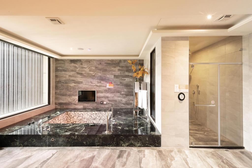 TV a/nebo společenská místnost v ubytování 覓玥精品時尚旅館 Mi Yue Boutique Motel