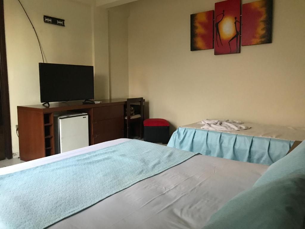Postel nebo postele na pokoji v ubytování Hotel Viru Viru II