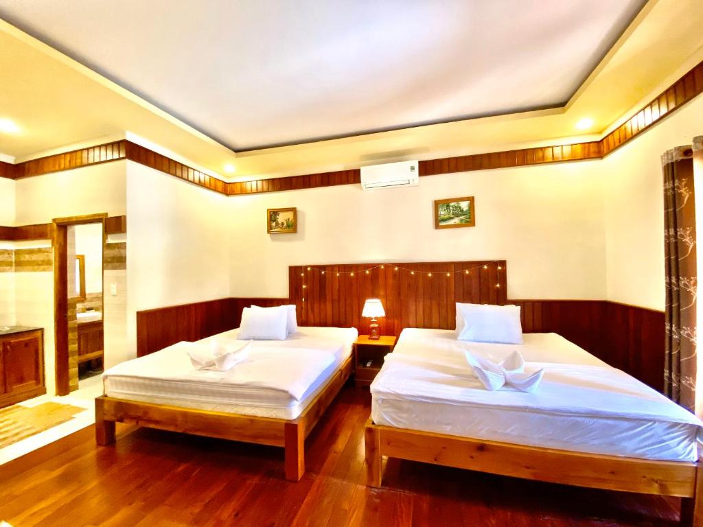 Katil atau katil-katil dalam bilik di Villa Lien Tho
