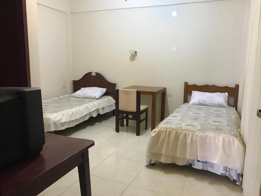Postel nebo postele na pokoji v ubytování Hotel Viru Viru II