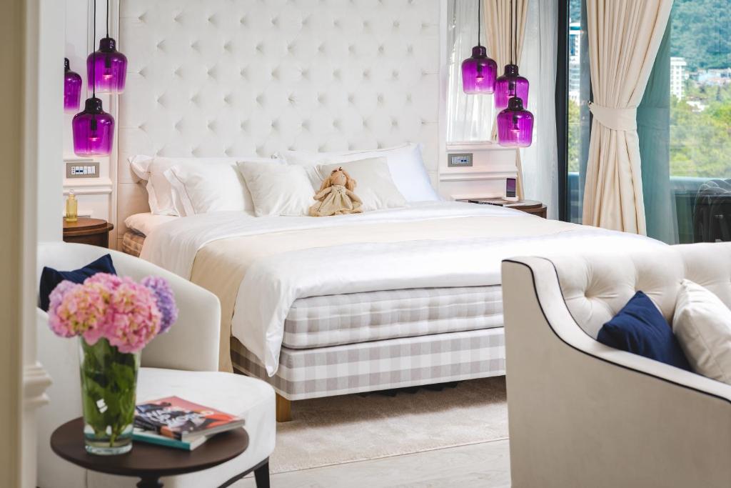 Postel nebo postele na pokoji v ubytování Boutique Hotel Vissi d'Arte