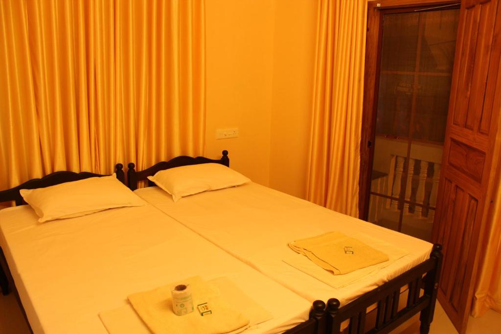 Postel nebo postele na pokoji v ubytování Bastian Homestay