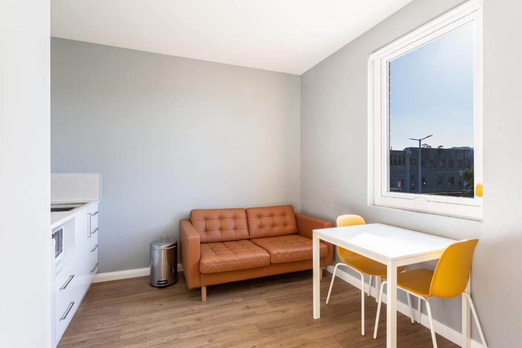 Posezení v ubytování Mayfair Plaza Motel and Apartments