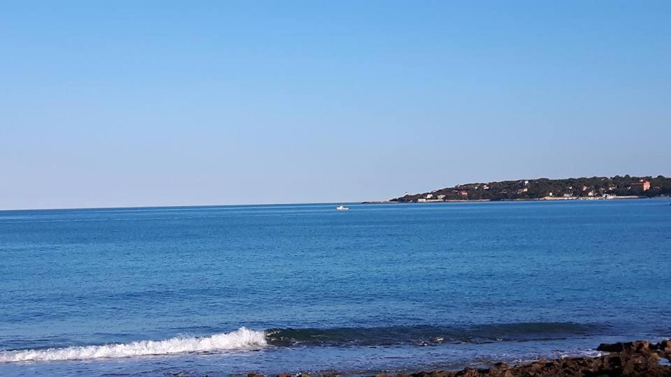 a body of water with a small wave at Piccolo Hotel in Rosignano Solvay