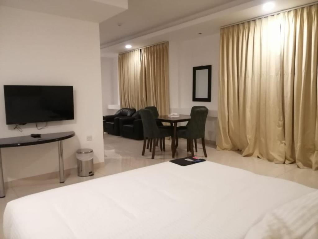 TV a/nebo společenská místnost v ubytování Parkside Plaza Muscat