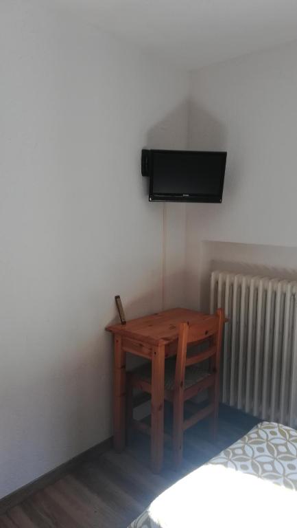 Telewizja i/lub zestaw kina domowego w obiekcie Affittacamere Entreves