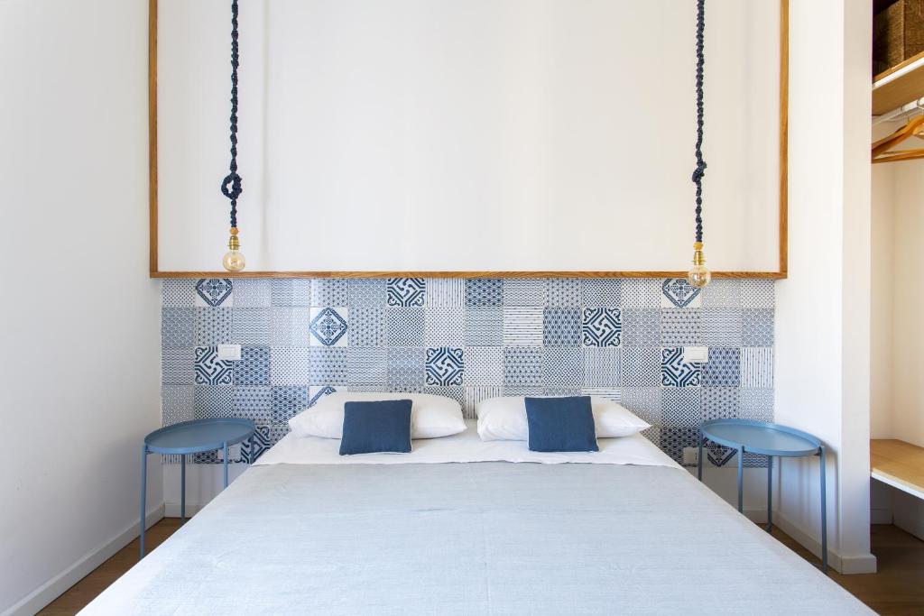Postel nebo postele na pokoji v ubytování Canceddi Rooms