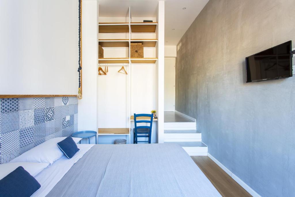 Postel nebo postele na pokoji v ubytování Canceddi Rooms