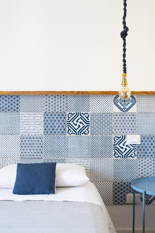 Postel nebo postele na pokoji v ubytování Canceddi Rooms