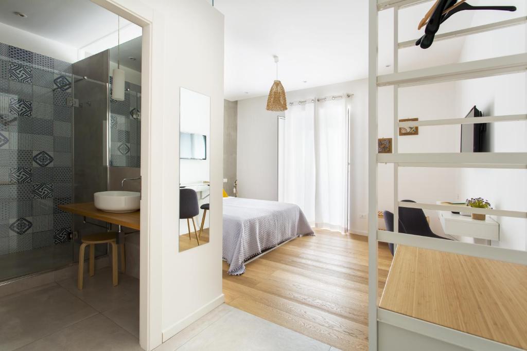 Postel nebo postele na pokoji v ubytování Canceddi Rooms