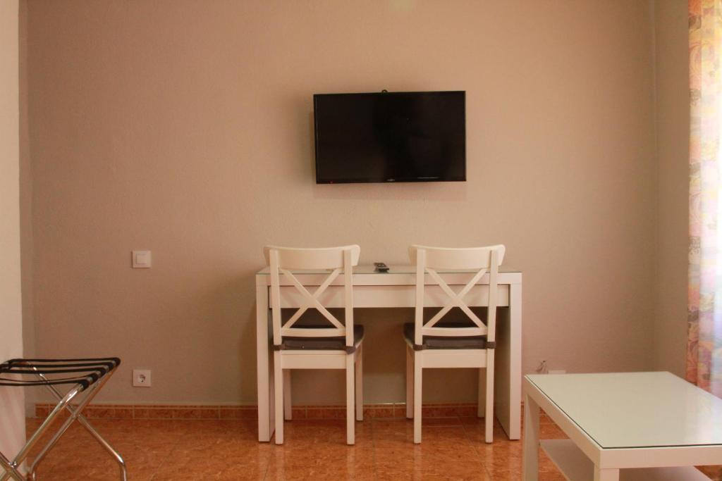 TV a/nebo společenská místnost v ubytování Apartamentos Resitur