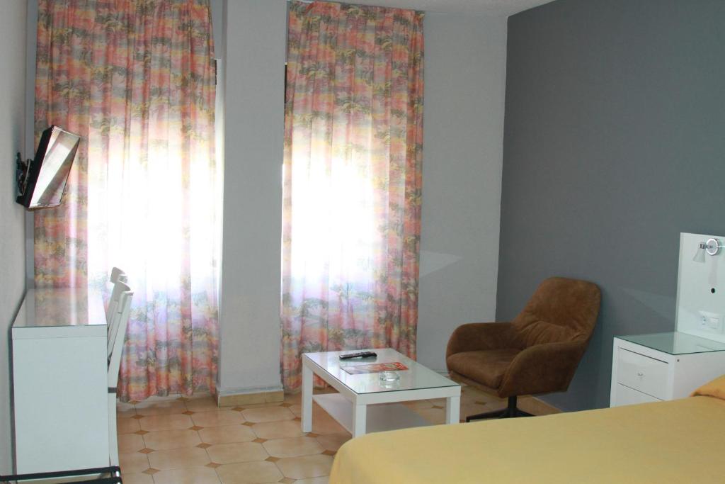 TV a/nebo společenská místnost v ubytování Apartamentos Resitur