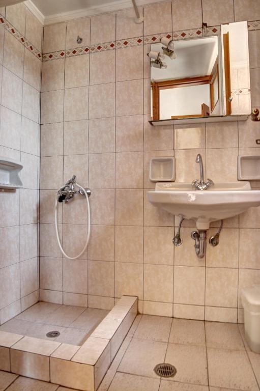 Koupelna v ubytování Guesthouse Palataki