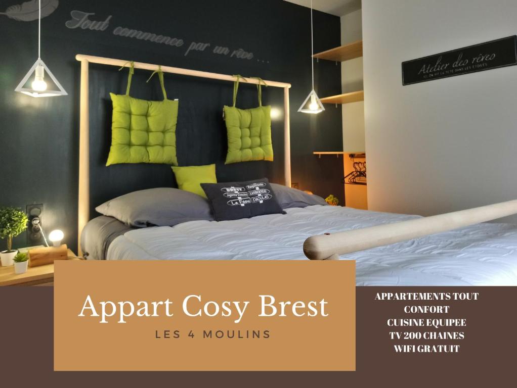 En eller flere senge i et værelse på Appart Cosy Brest (Les 4 moulins)