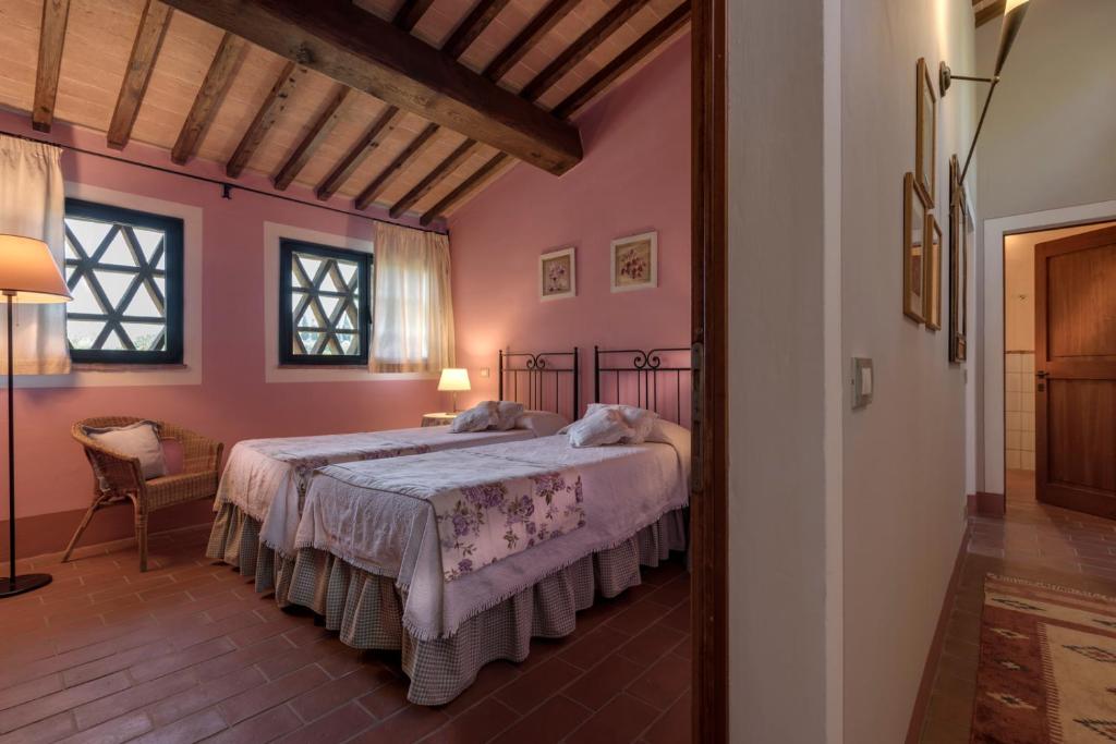 Postel nebo postele na pokoji v ubytování Il Borghetto Tuscan Holidays