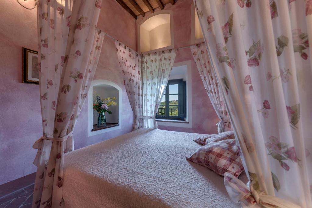 Postel nebo postele na pokoji v ubytování Il Borghetto Tuscan Holidays