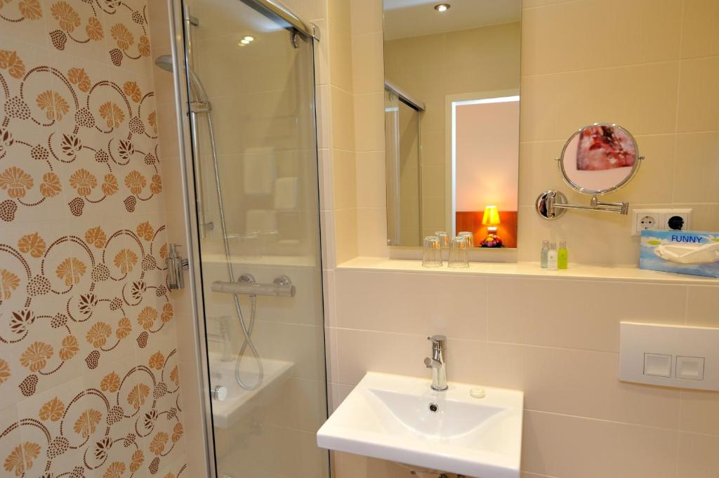 Koupelna v ubytování Hotel Vis à vis
