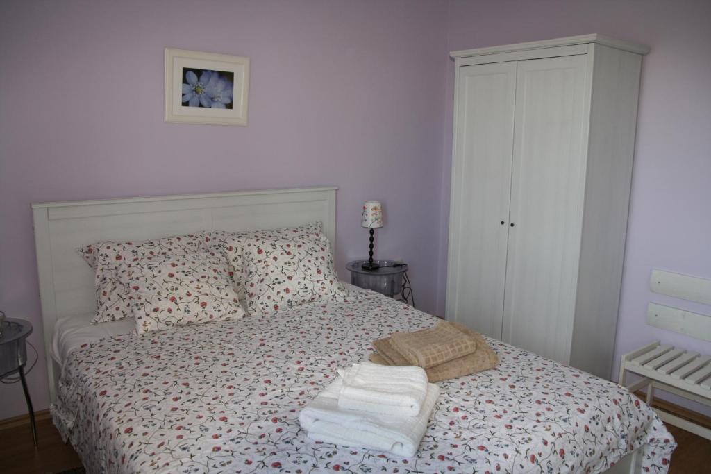 Postel nebo postele na pokoji v ubytování Apartments Roža