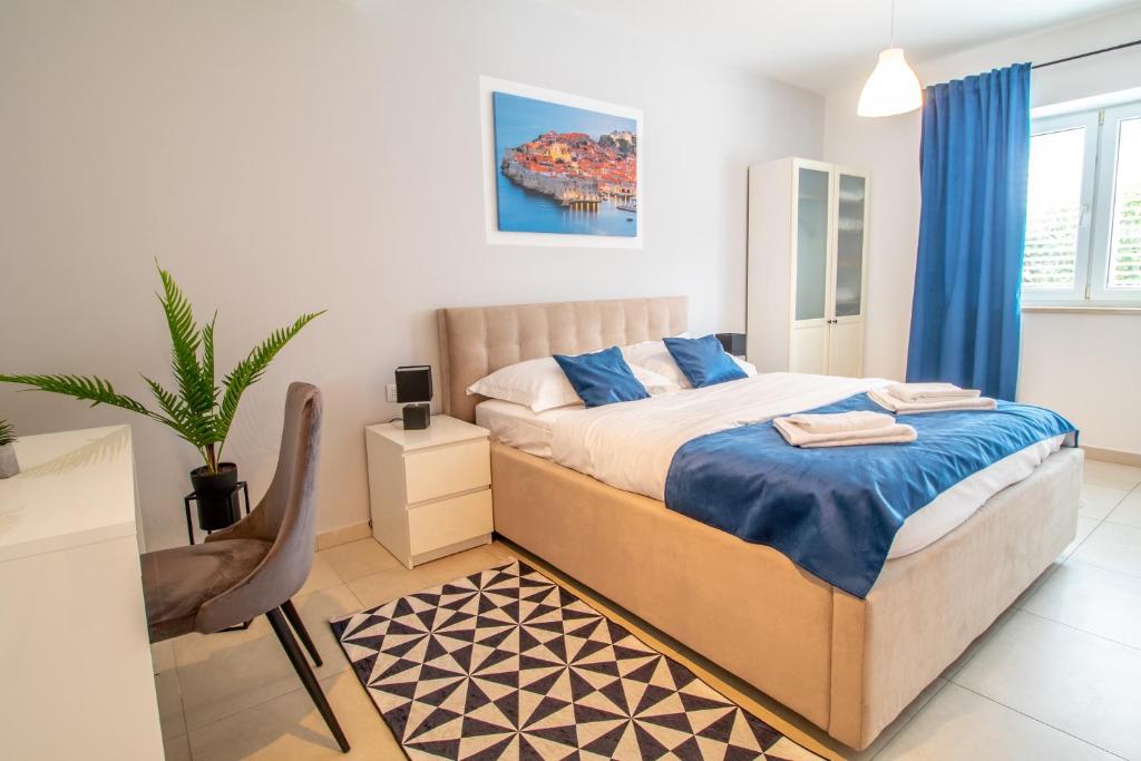 Postel nebo postele na pokoji v ubytování Apartments Vito