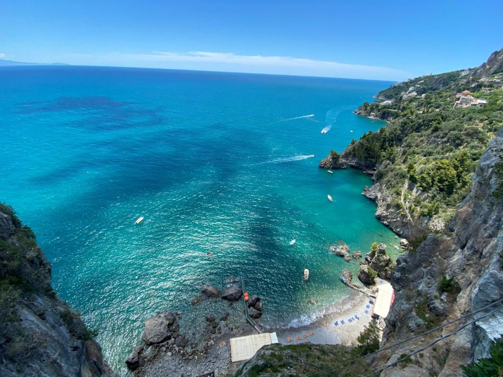 an aerial view of a beach on a cliff at Matteo's House B&b in Amalfi
