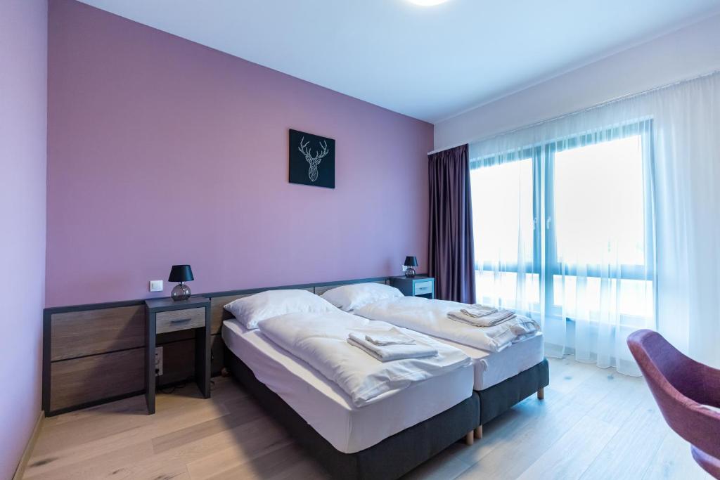 Postel nebo postele na pokoji v ubytování A22 Hotel Gyál