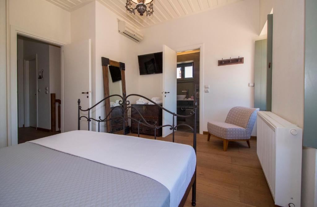 Posteľ alebo postele v izbe v ubytovaní Laconian Collection Villa Magoula