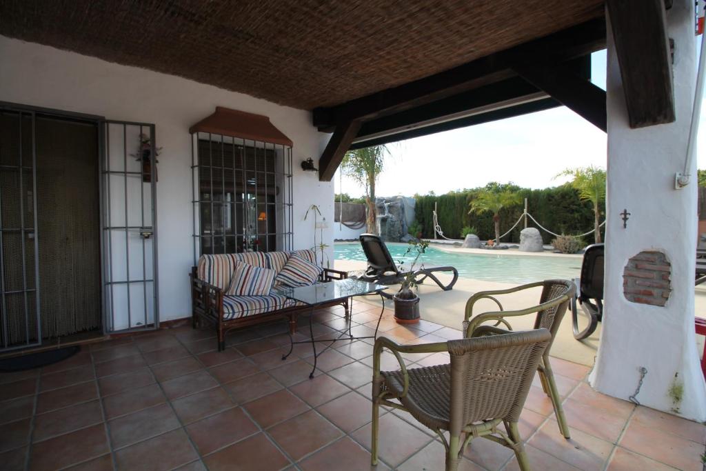 Bazén v ubytování Villa Cortijillo SpainSunRentals 1102 nebo v jeho okolí
