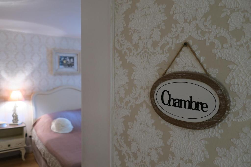 Postel nebo postele na pokoji v ubytování La Naomath - Maison d'hôtes, Hébergement insolite & Gîte