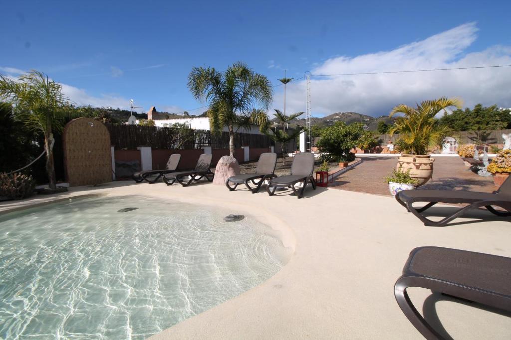 Bazén v ubytování Villa Cortijillo SpainSunRentals 1102 nebo v jeho okolí