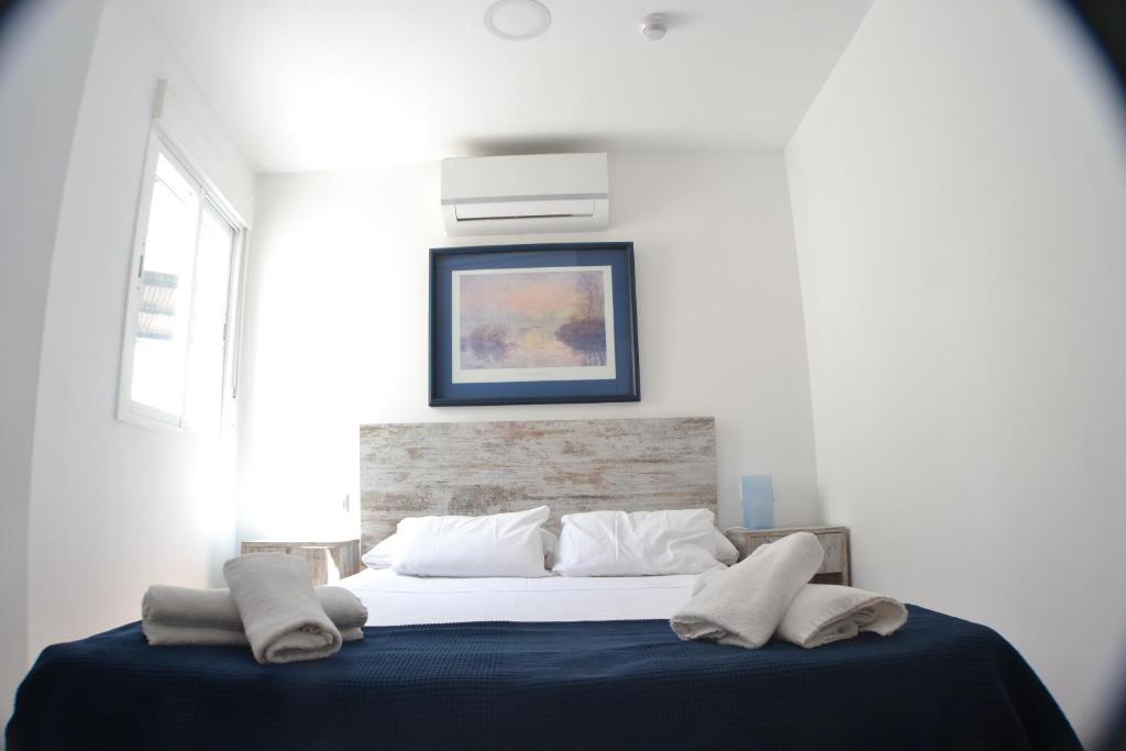 Posteľ alebo postele v izbe v ubytovaní Hotel Boutique Nomadas