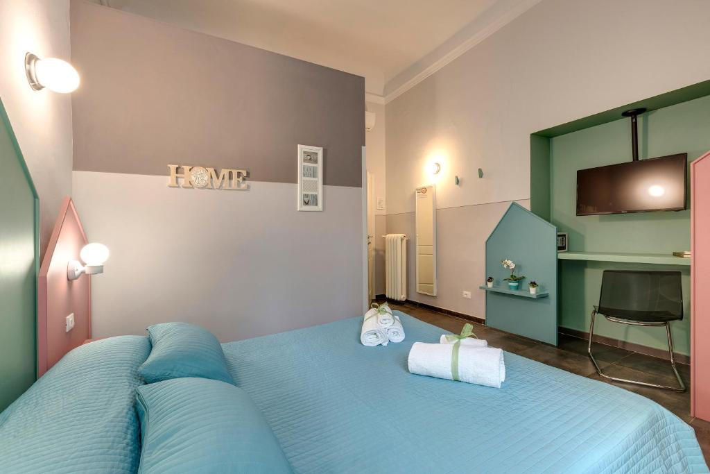 A bed or beds in a room at Al Consolato - Guest house
