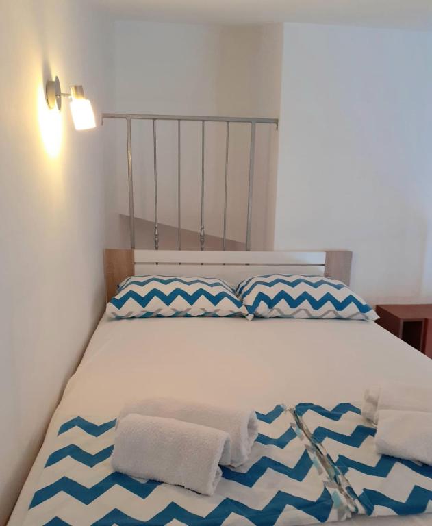 Posteľ alebo postele v izbe v ubytovaní Apartman Petković