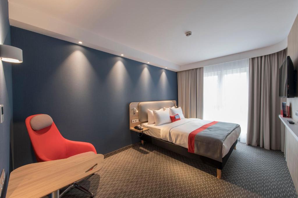 Posteľ alebo postele v izbe v ubytovaní Holiday Inn Express Warsaw - Mokotow by IHG