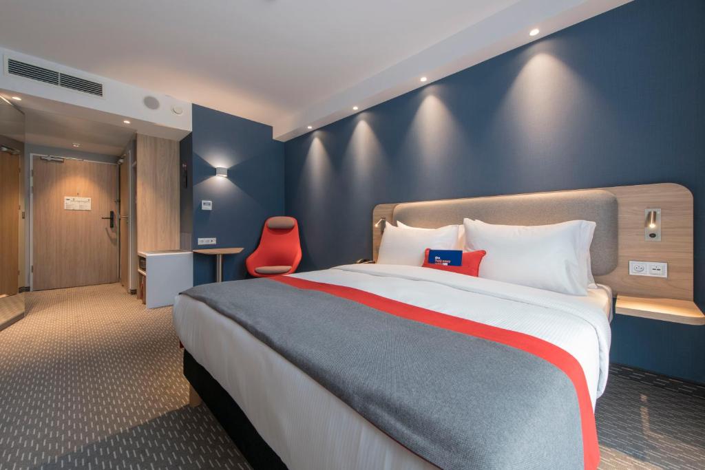 Posteľ alebo postele v izbe v ubytovaní Holiday Inn Express Warsaw - Mokotow by IHG