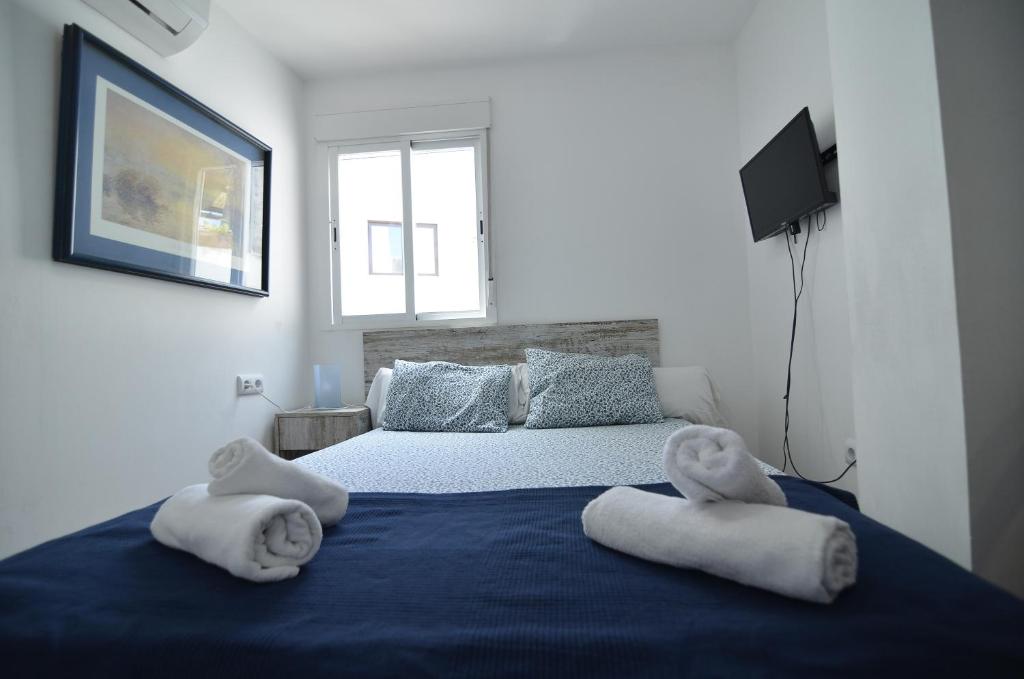 Posteľ alebo postele v izbe v ubytovaní Hotel Boutique Nomadas