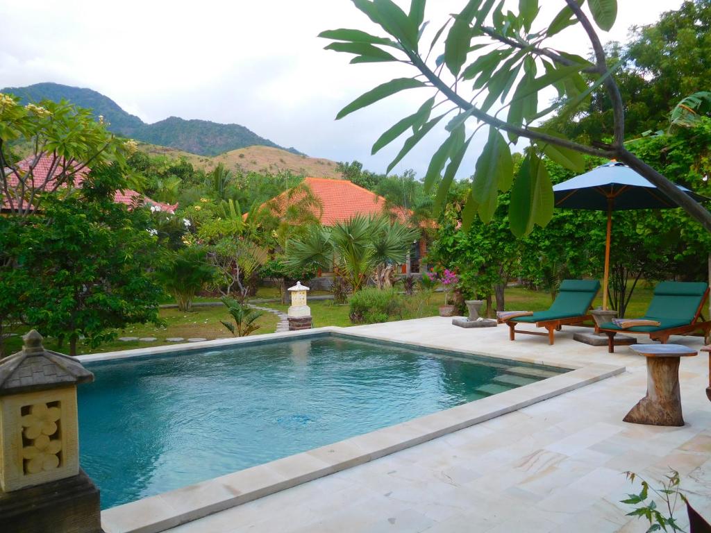 Bazén v ubytování TEGAL SARI, Pemuteran- North Bali nebo v jeho okolí