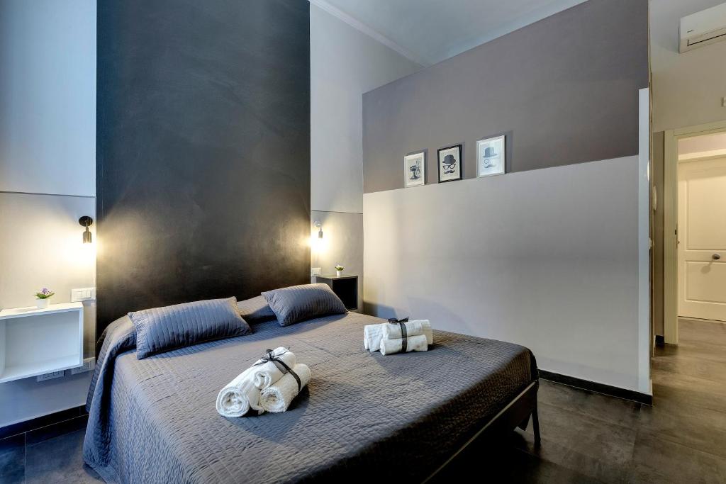 A bed or beds in a room at Al Consolato - Guest house
