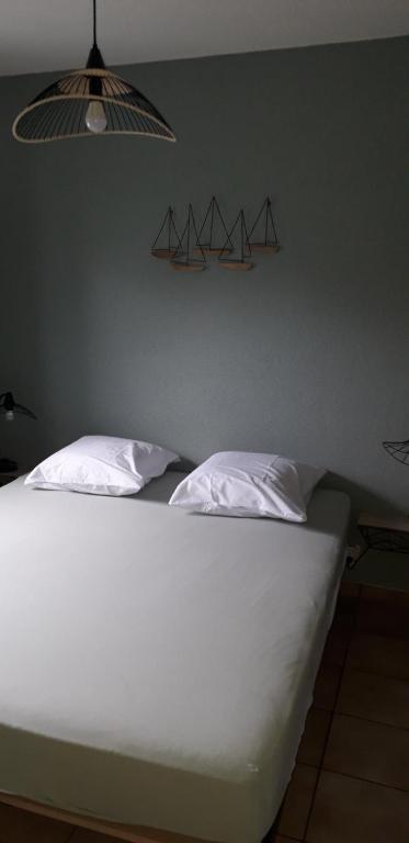 Postel nebo postele na pokoji v ubytování Appartement à Bredene au rez-de-chaussée