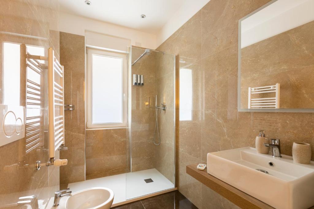 Kúpeľňa v ubytovaní Momo Central Rome 1
