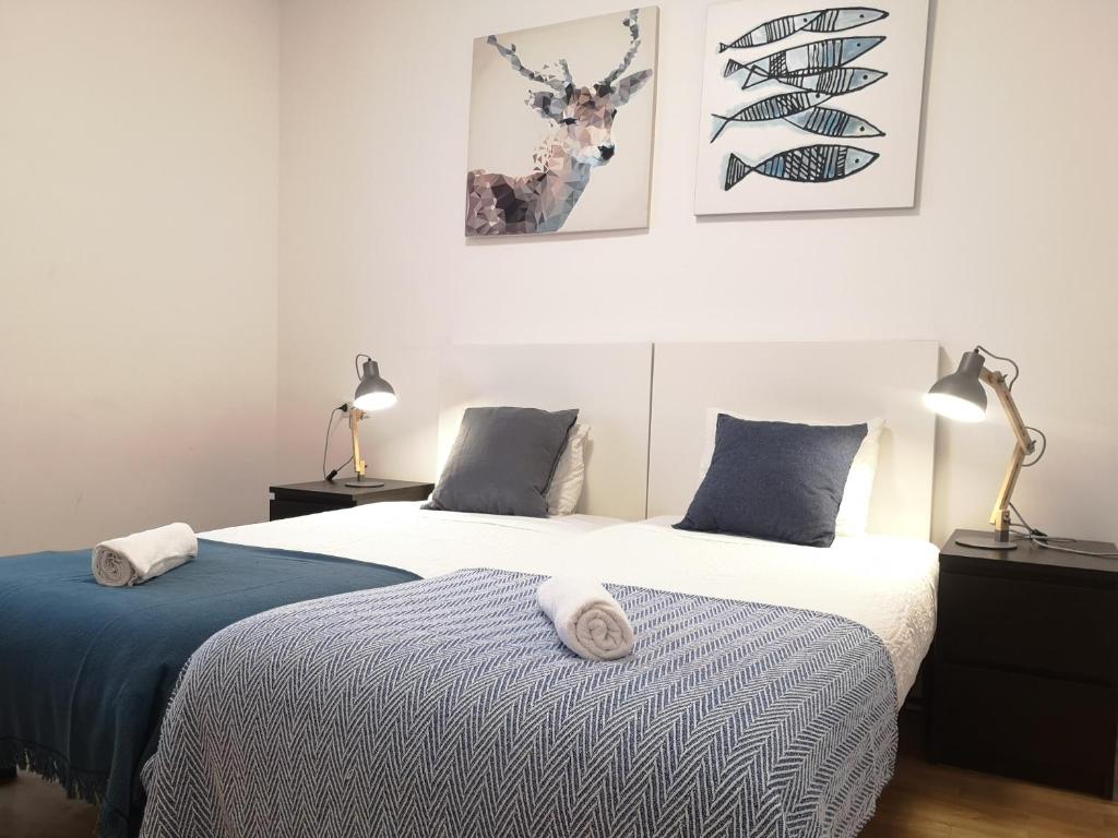 Posteľ alebo postele v izbe v ubytovaní Apartamento Amplio y Central a pie de Playa la Concha