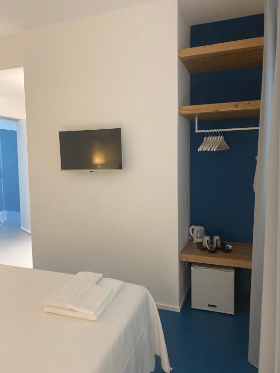 Postel nebo postele na pokoji v ubytování Near Ortigia