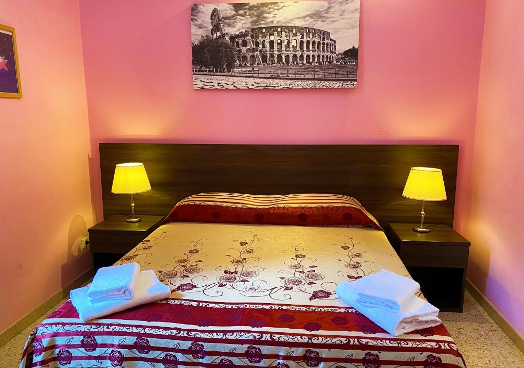 Postel nebo postele na pokoji v ubytování Sweet Dream Roma Termini