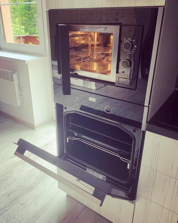 A television and/or entertainment centre at Apartmán Paseky