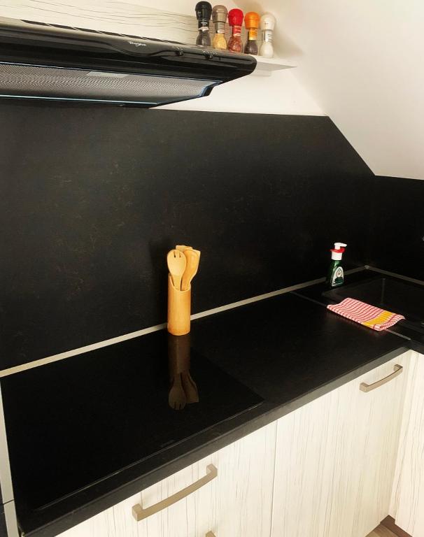 A kitchen or kitchenette at Apartmán Paseky