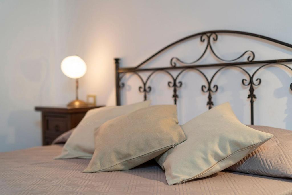 Postel nebo postele na pokoji v ubytování Poesia del Mare B&B