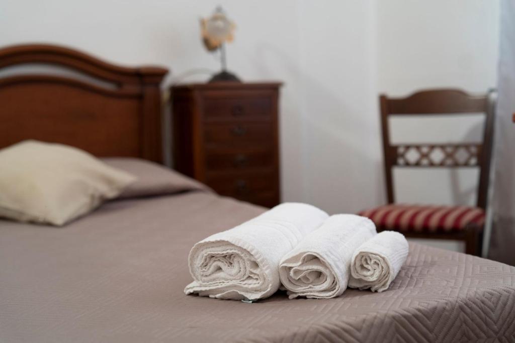 Postel nebo postele na pokoji v ubytování Poesia del Mare B&B
