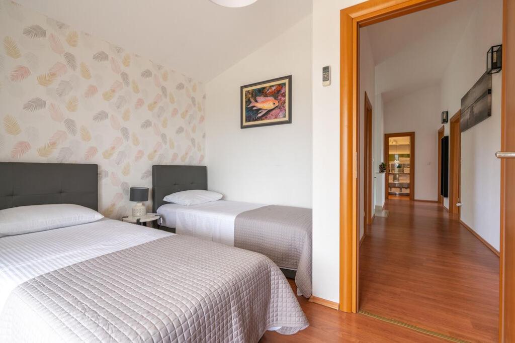 Posteľ alebo postele v izbe v ubytovaní Villa Bliss , Kastela - Croatia