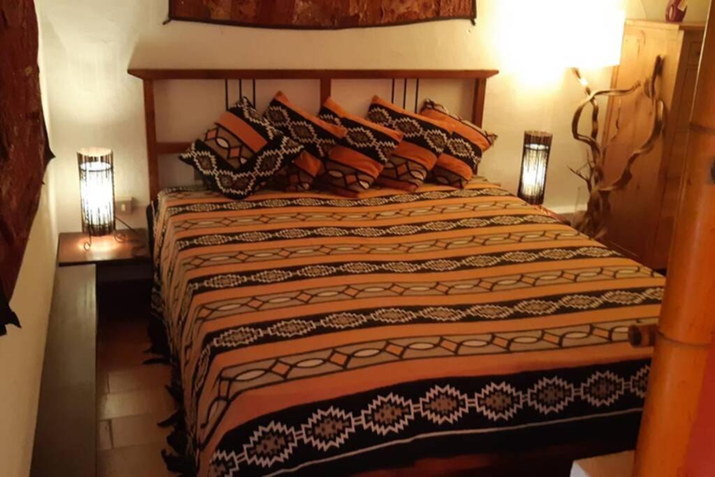 Postel nebo postele na pokoji v ubytování Casa Elicriso
