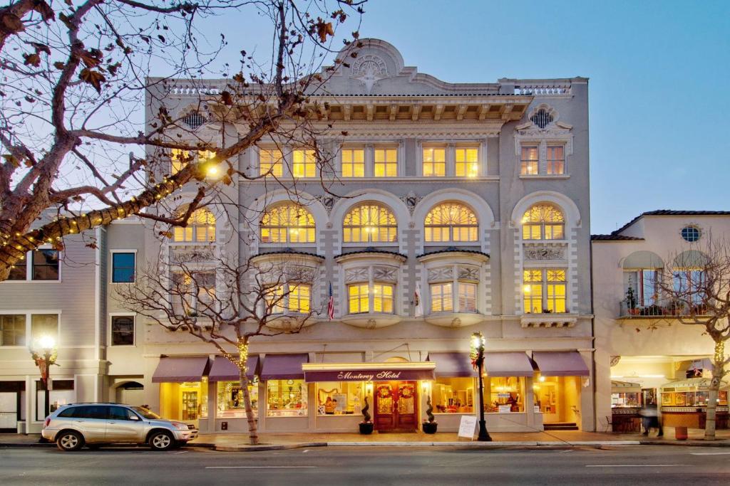 a large building with a large window in front of it at The Monterey Hotel in Monterey